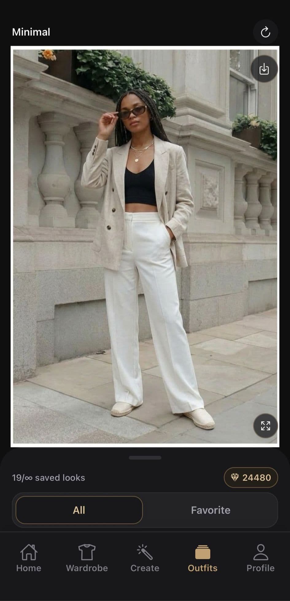 OutfitSnap saved outfits screen showing generated outfit results.